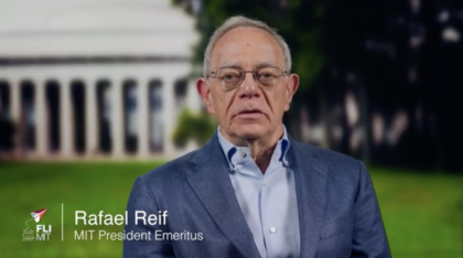 Rafael Reif with a classical columned building in the background.